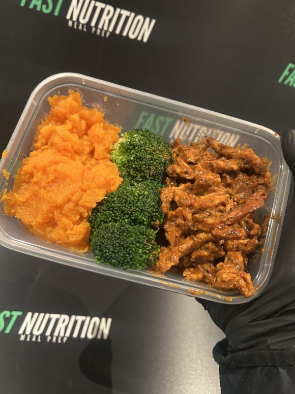 Healthy high-protein meal with broccoli, sweet potatoes, and beef. Perfect for fitness nutrition.