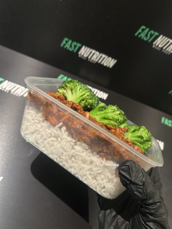 Delicious healthy meal featuring rice, broccoli, and protein, perfect for fitness and nutrition goals.
