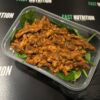 Healthy chicken with greens, perfect for muscle recovery and fitness nutrition.