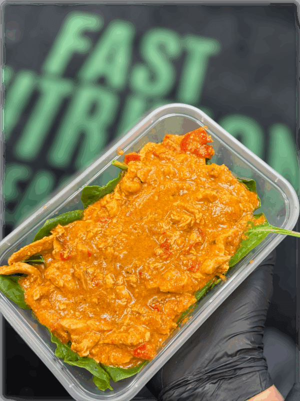 Healthy protein meal in a portable container, ideal for fitness enthusiasts or meal prep plans.